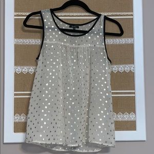 Sleeveless gold polkadotted top